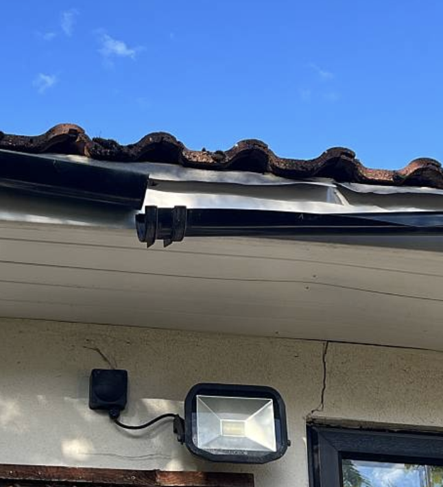 Bowing gutters and pilling away from fascia