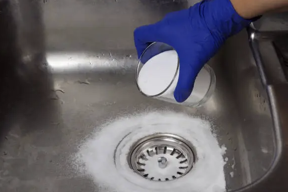 using baking soda to clean kitchen sink drain